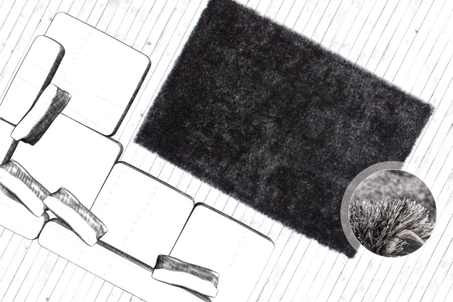 How to Use Rugs to Define Different Spaces in an Open Plan Layout